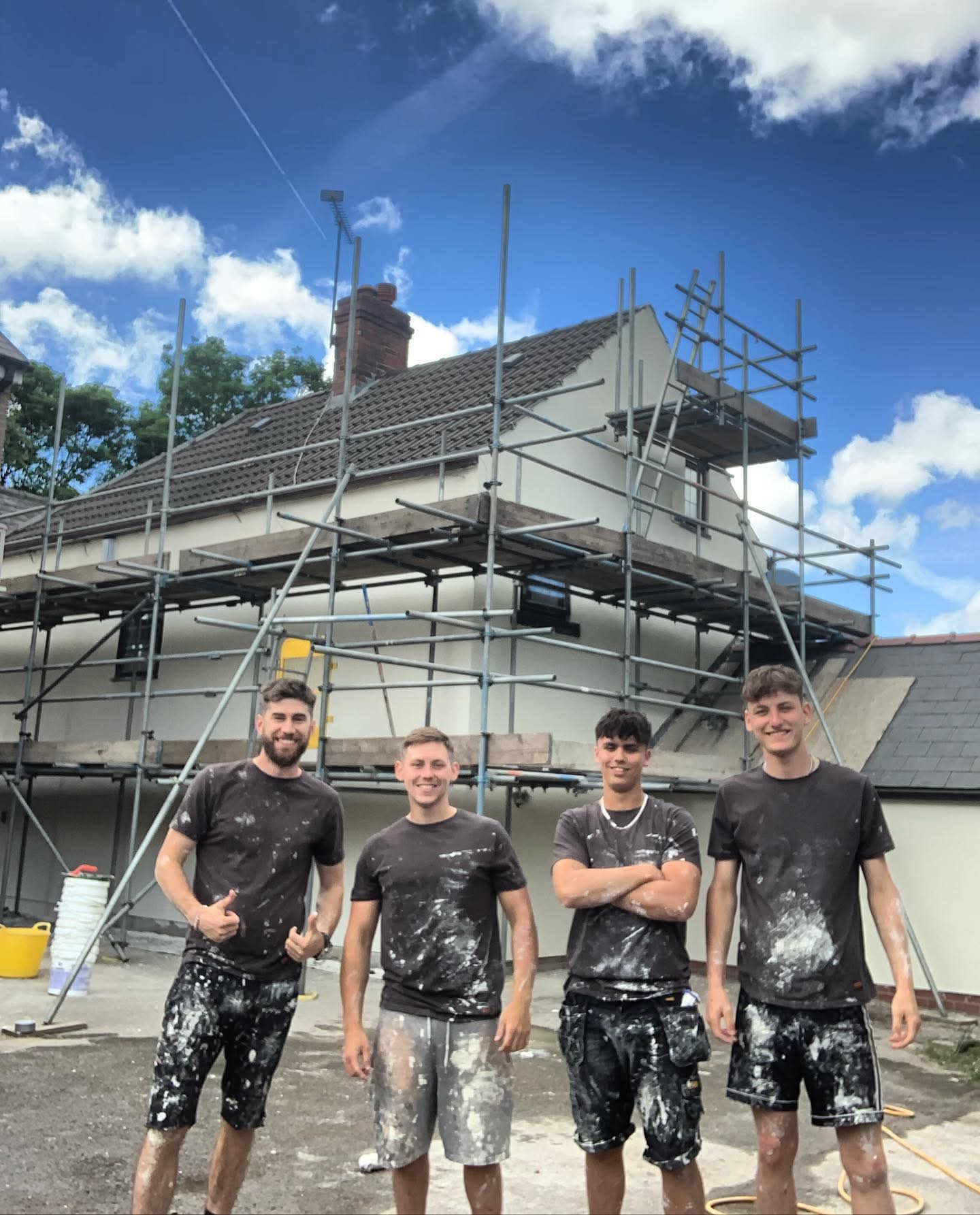 The Rosewoods Rendering team in front of a freshly rendered home